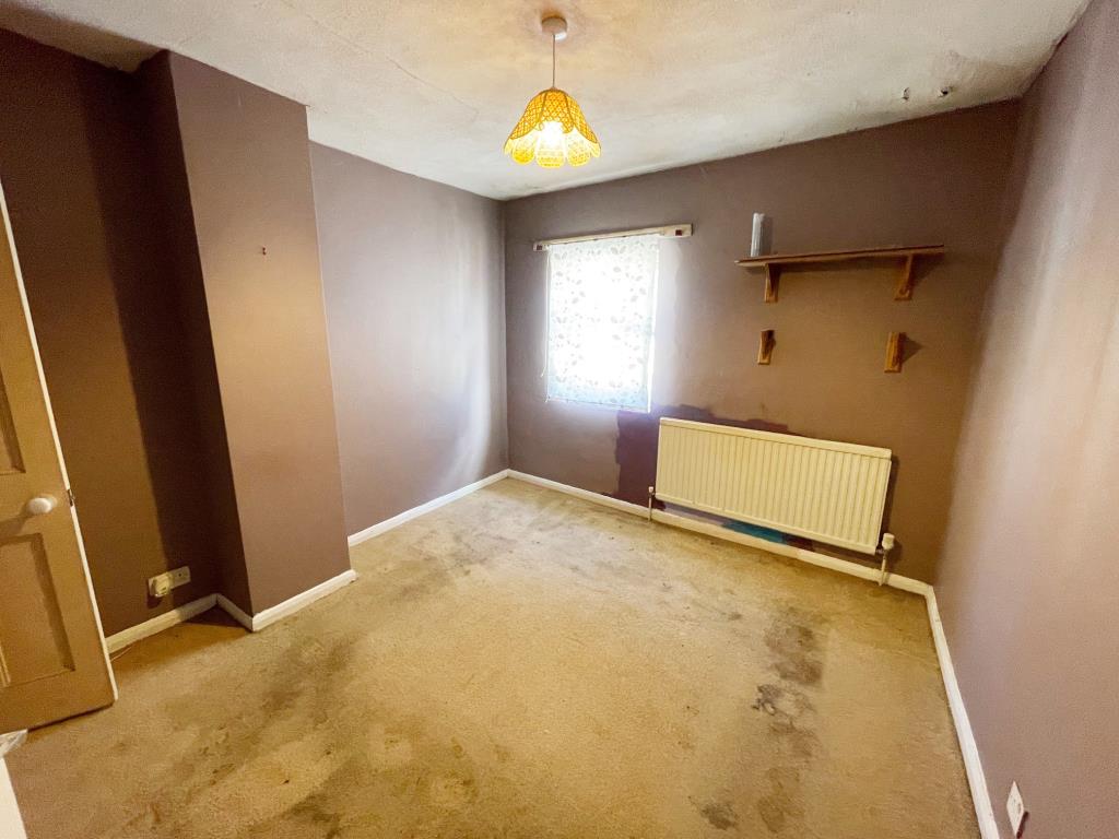 Lot: 144 - TERRACE HOUSE FOR IMPROVEMENT - Bedroom 1 with window to the front